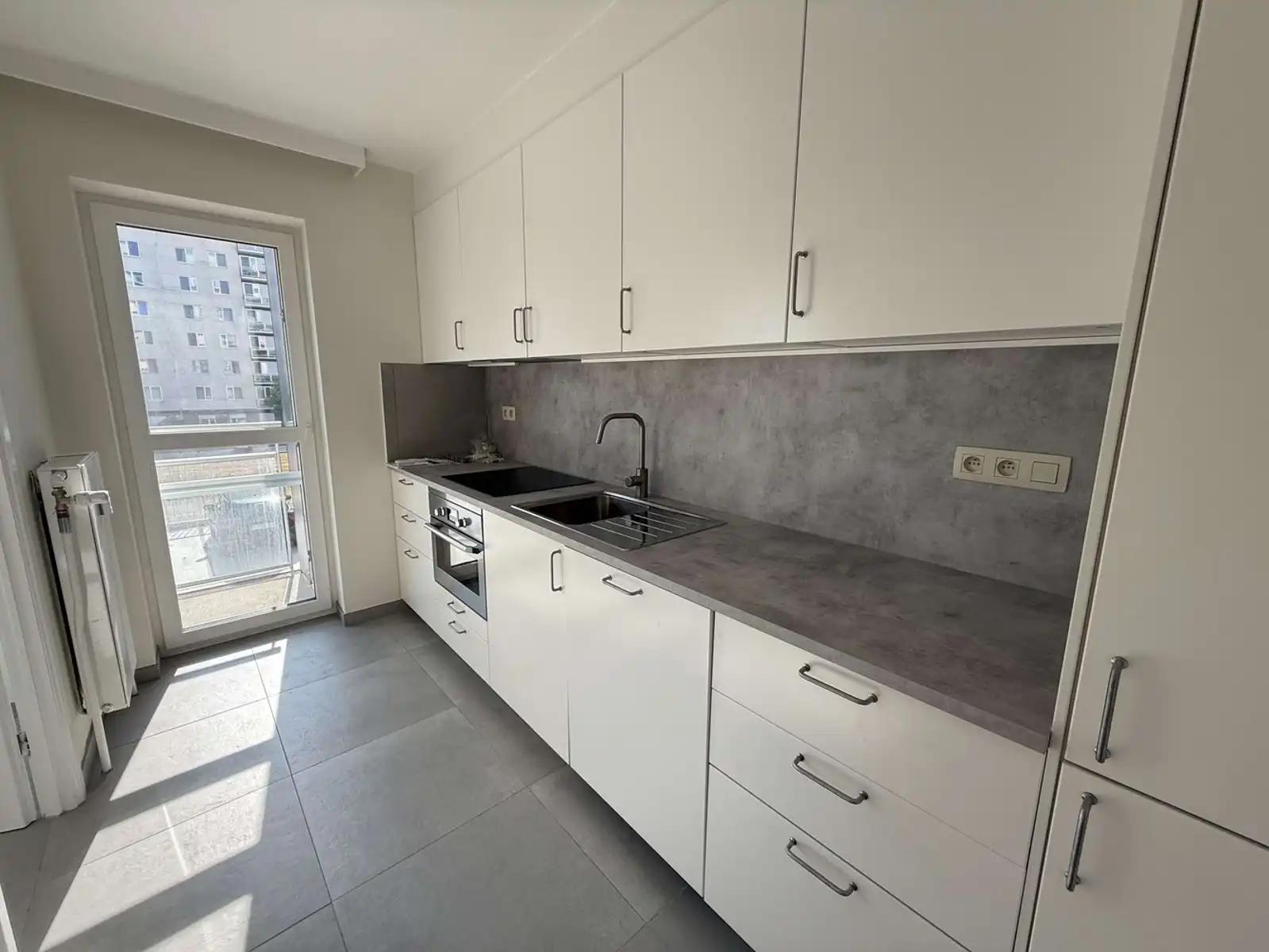 Volledig gerenoveerd appartement met 2 slaapkamers en ruim zonneterras te huur in Heverlee (Leuven) foto 4