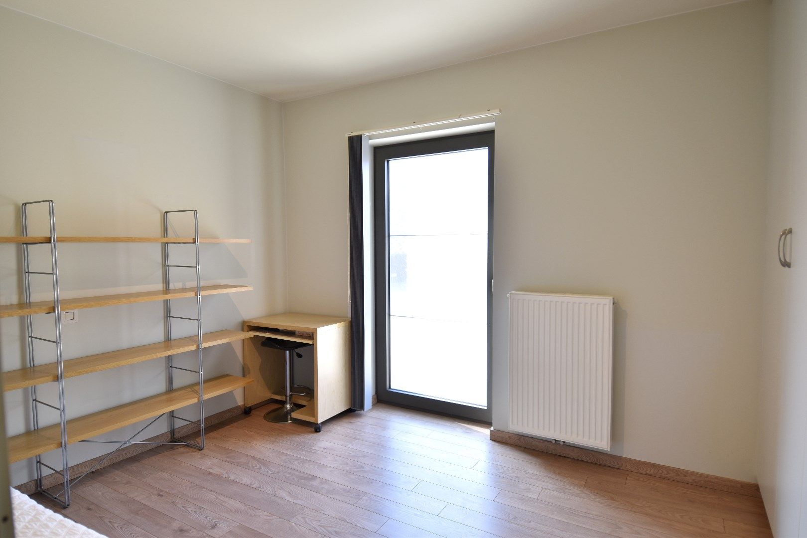 Recent 1-slaapkamerappartement (BJ 2017) met autostaanplaats te koop in een groene omgeving te Heule foto 9