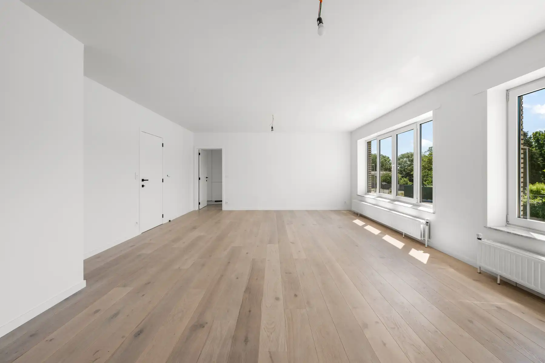 Gerenoveerd 2 slaapkamerappartement met garage foto 3