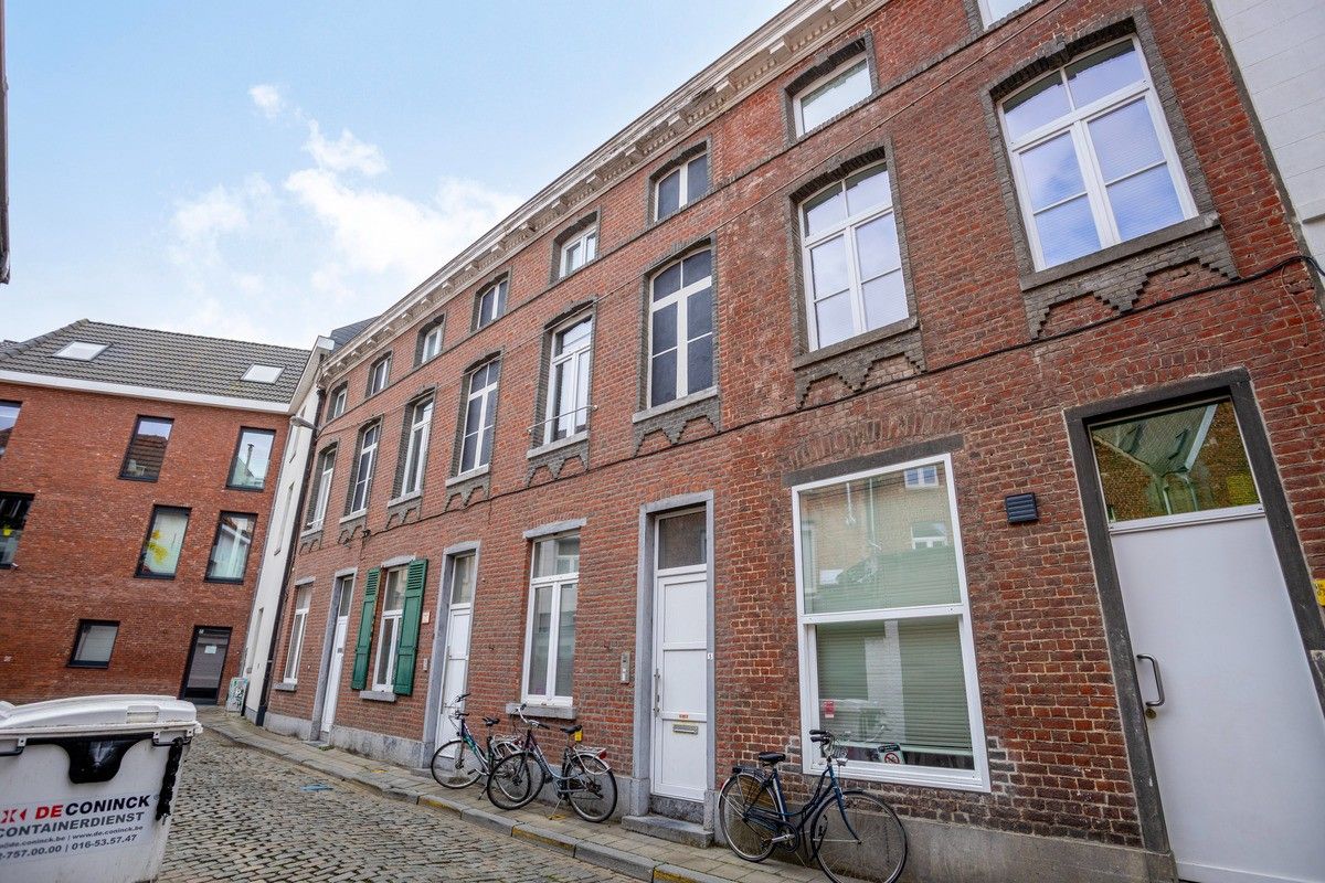 Opbrengsteigendom met 5 studentenkamers op toplocatie in hartje Leuven foto {{pictureIndex}}