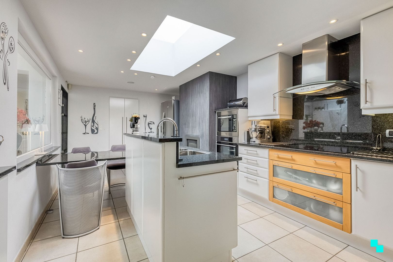 Woning met uitbreidingsmogelijkheden en gezellige tuin in het hart van Merelbeke foto 8