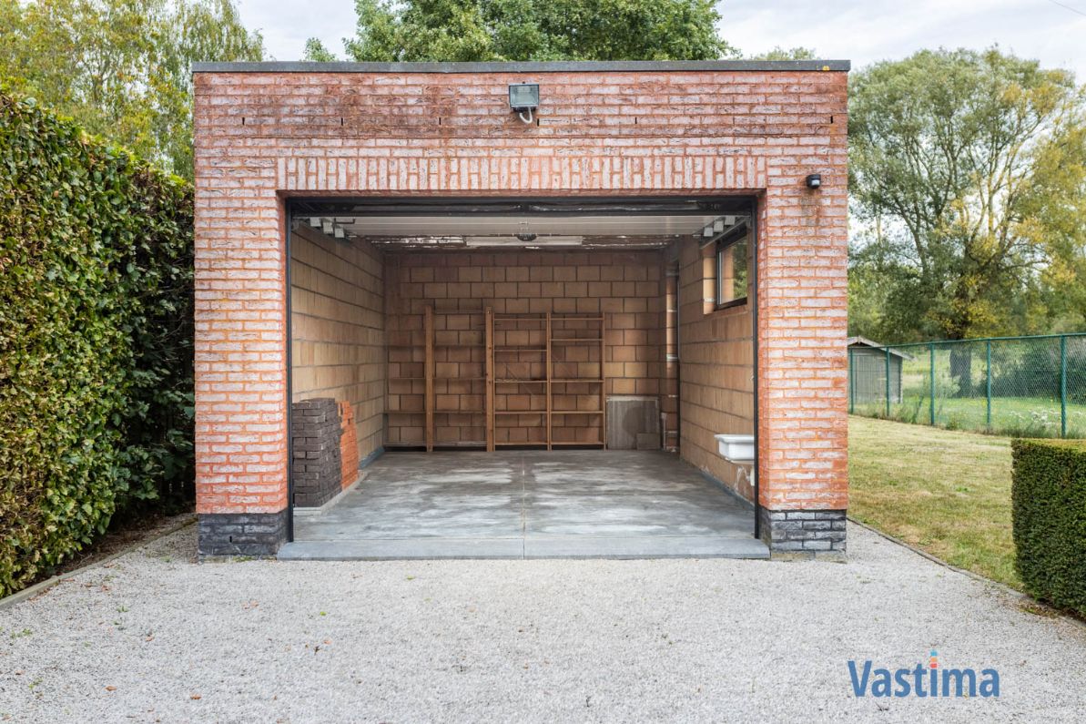 Ruime instapklare gezinswoning met zonnige tuin en garage foto 30