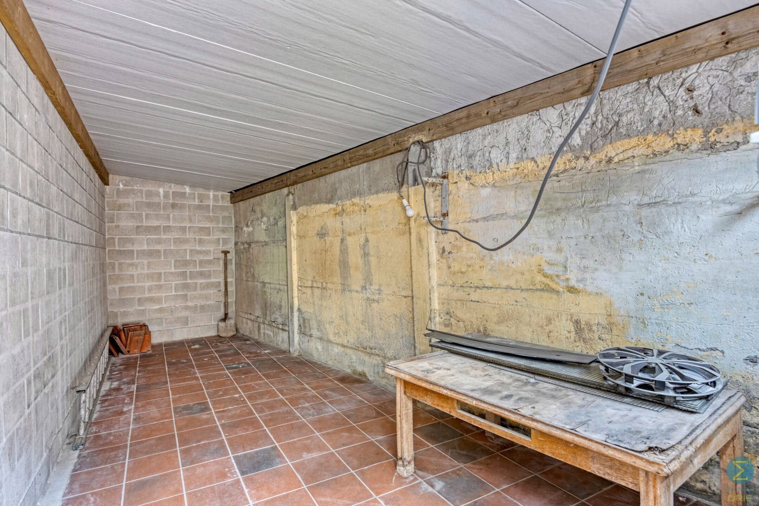 Te renoveren woning in centrum Arendonk. foto 23