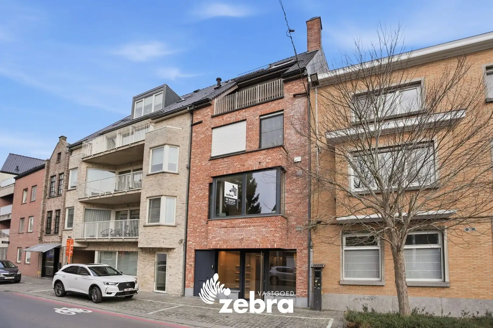 Eigentijdse stadswoning met lift, terras en topafwerking in het centrum van Roeselare! foto {{pictureIndex}}