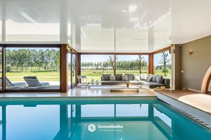 UNIEKE VILLA MET BINNENZWEMBAD EN PAARDENSTALLEN OP EEN TOPLOCATIE TE KOOP IN MENDONK (GENT) foto 21