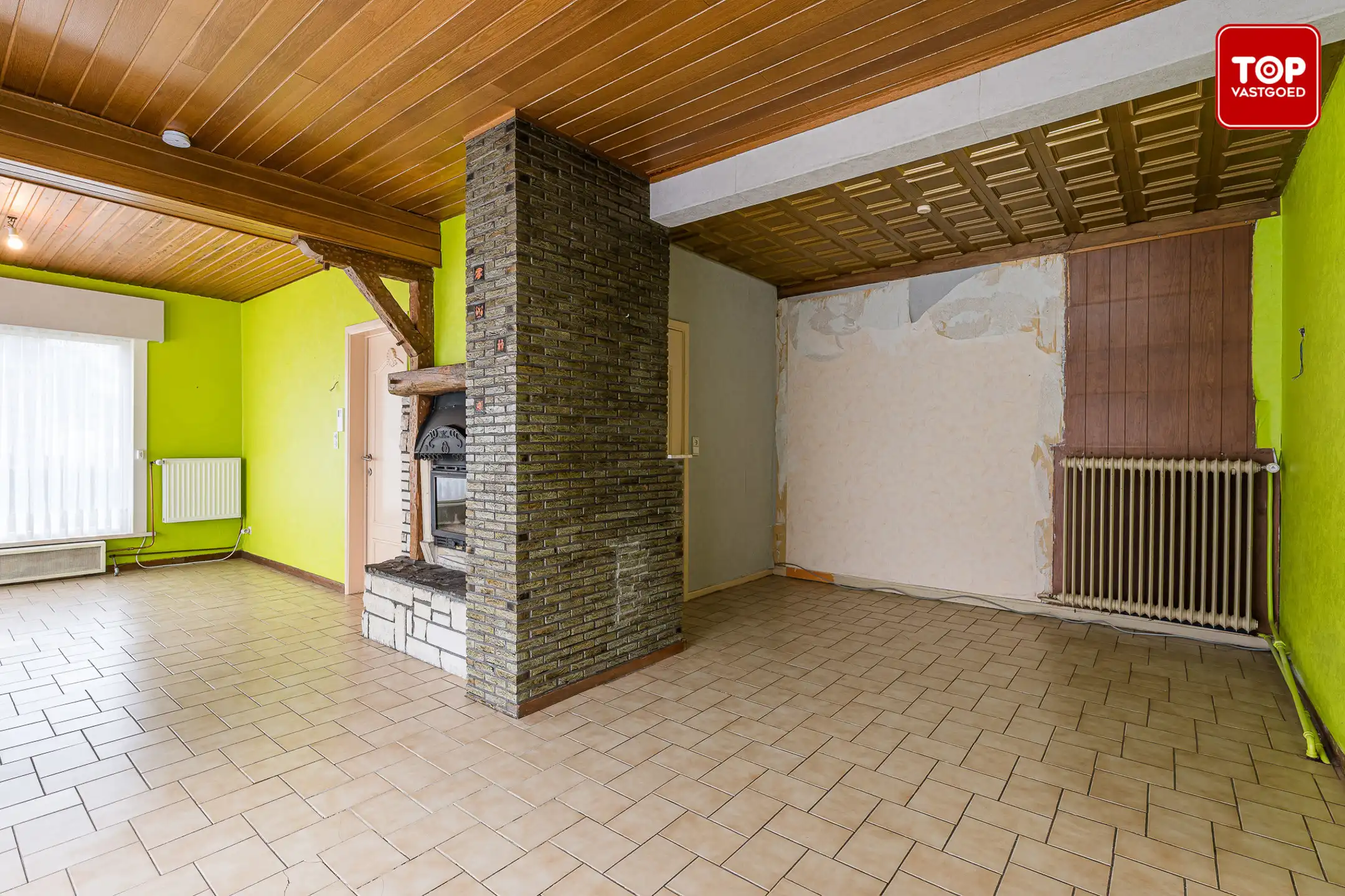 Op te frissen half open bebouwing met 3 slaapkamers, tuin en garage.  foto 5