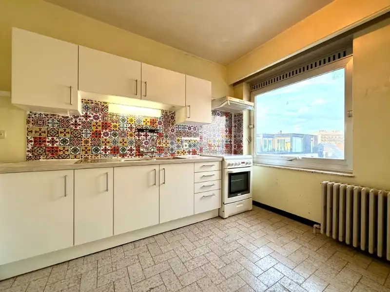 Ruim appartement met 2 slaapkamers en overdekt terrasje foto 4