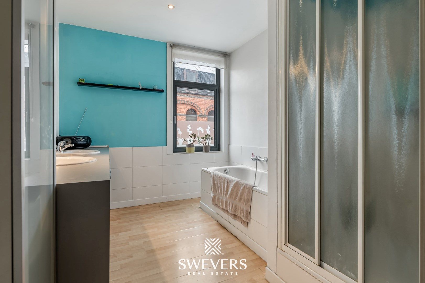 Te renoveren woning in hartje Beringen foto 12