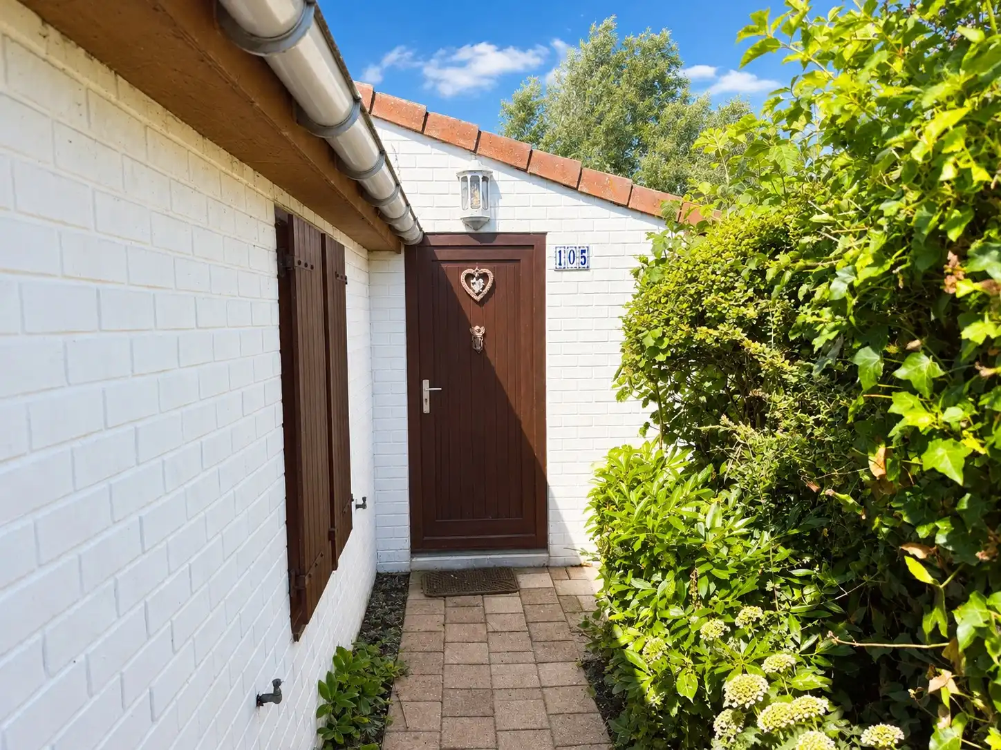 Charmante, licht op te frissen polderwoning te De Haan. foto 10