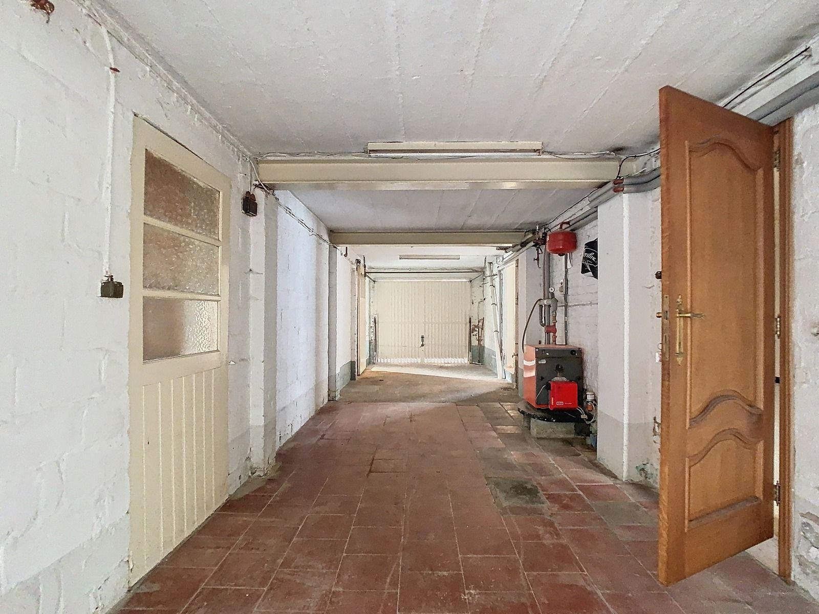 Zéér ruime, Te renoveren woning met 3 SLPK én garage! foto 15