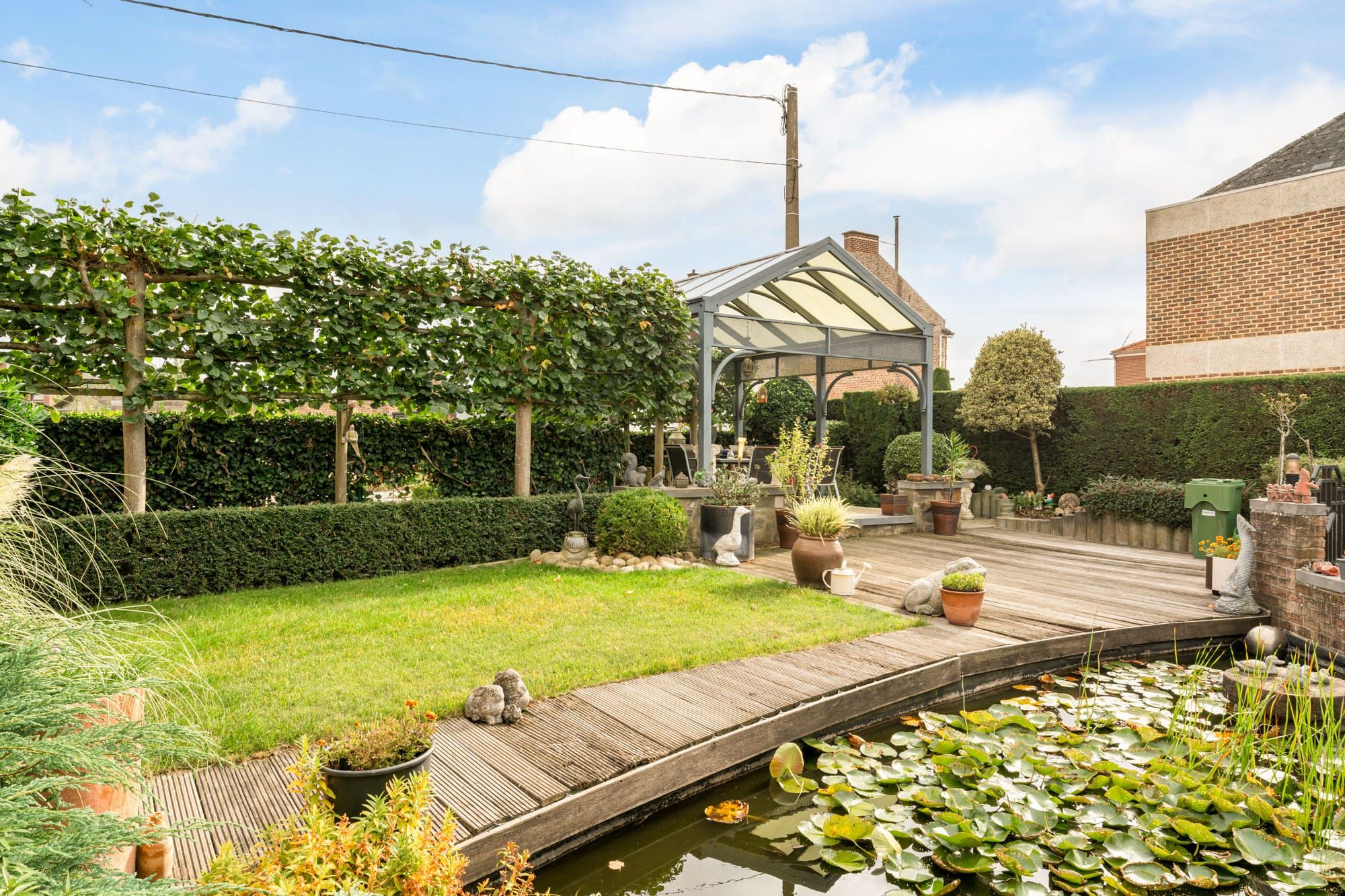 Ruime gezinswoning met knappe tuin en bouwgrondmogelijkheid in Vlijtingen! foto 24