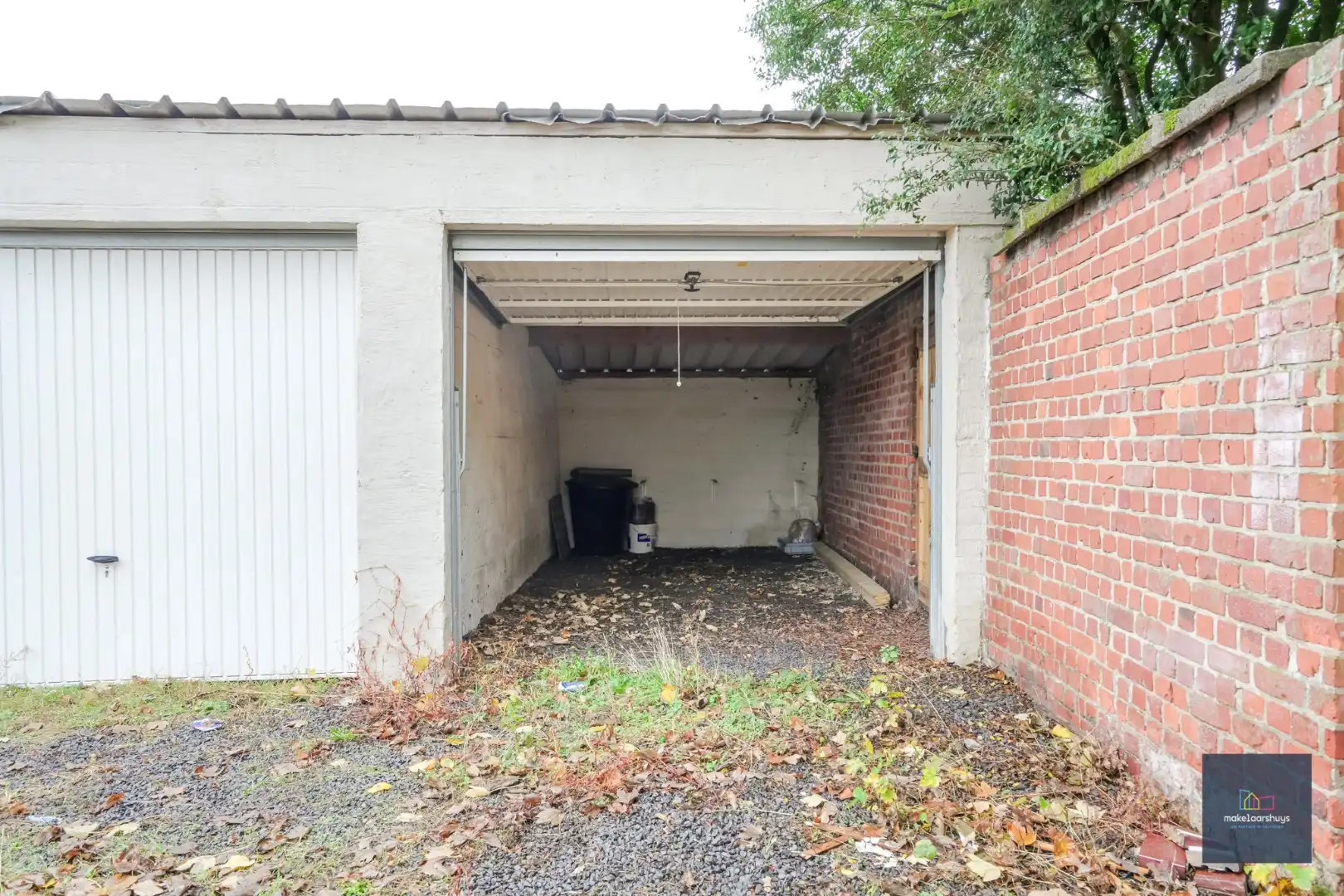 Ruim gelijkvloersappartement met 2 slaapkamers , een  zuidgeorienteerde  tuin en garage foto 12
