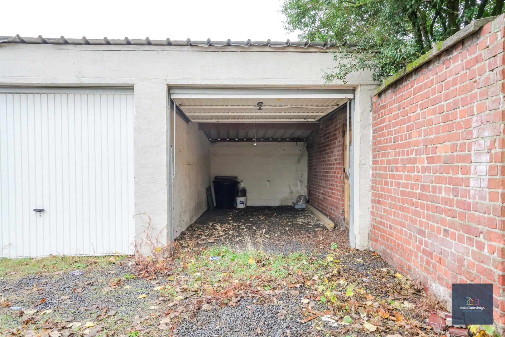 Ruim gelijkvloersappartement met 2 slaapkamers , een  zuidgeorienteerde  tuin en garage foto 4