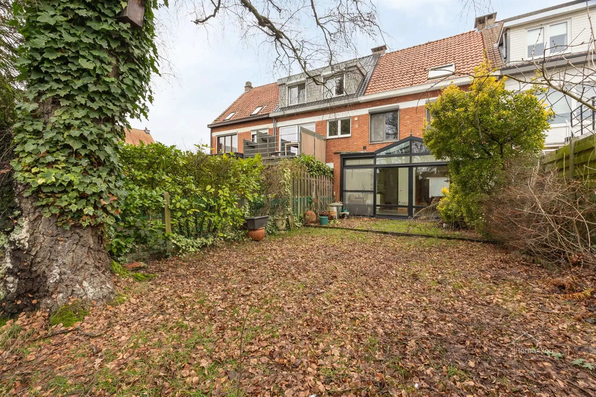 Ruime rijwoning op toplocatie met zongerichte tuin foto 21