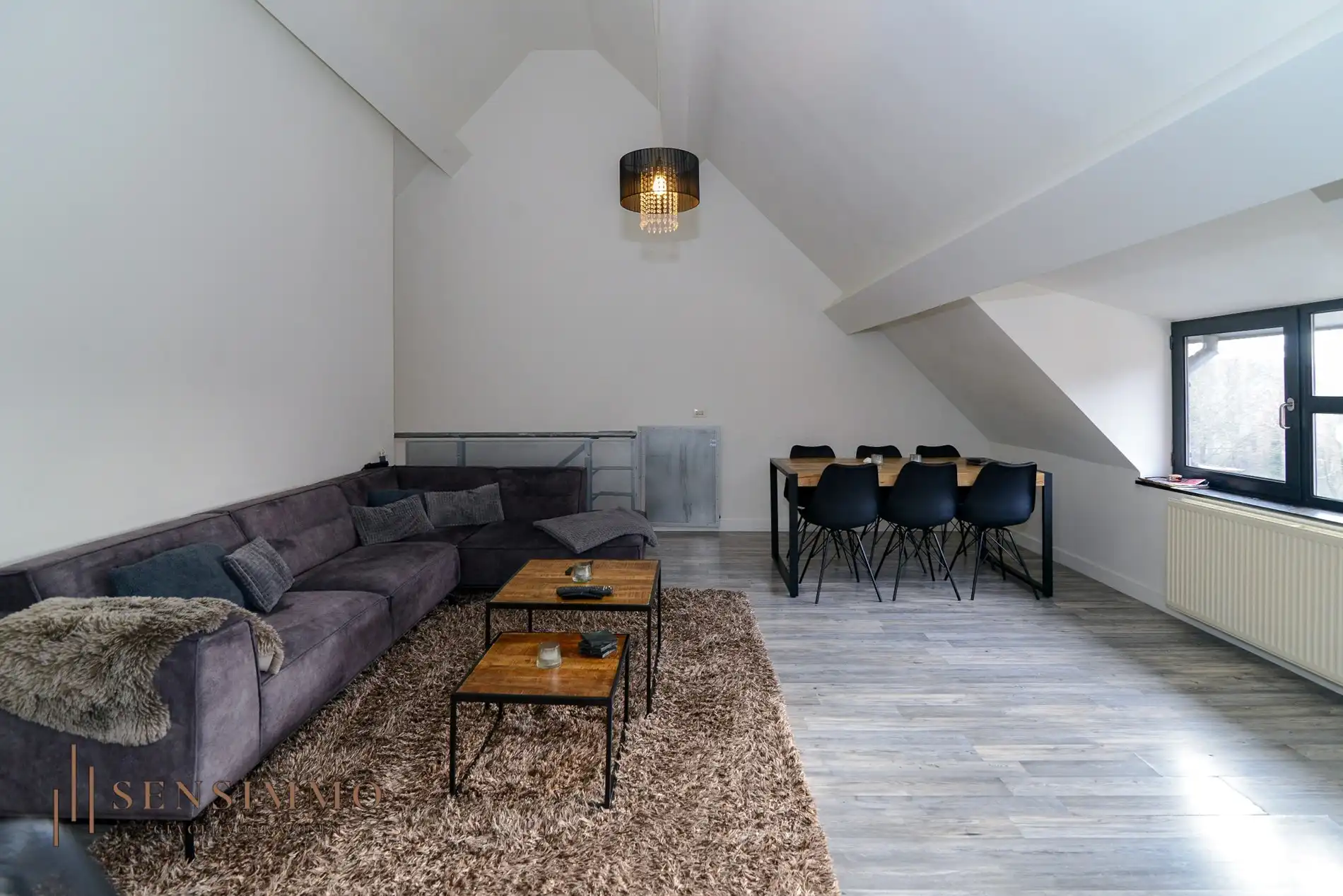 Commerciële handelspand met bovenliggend appartement in hartje Maasmechelen foto 4