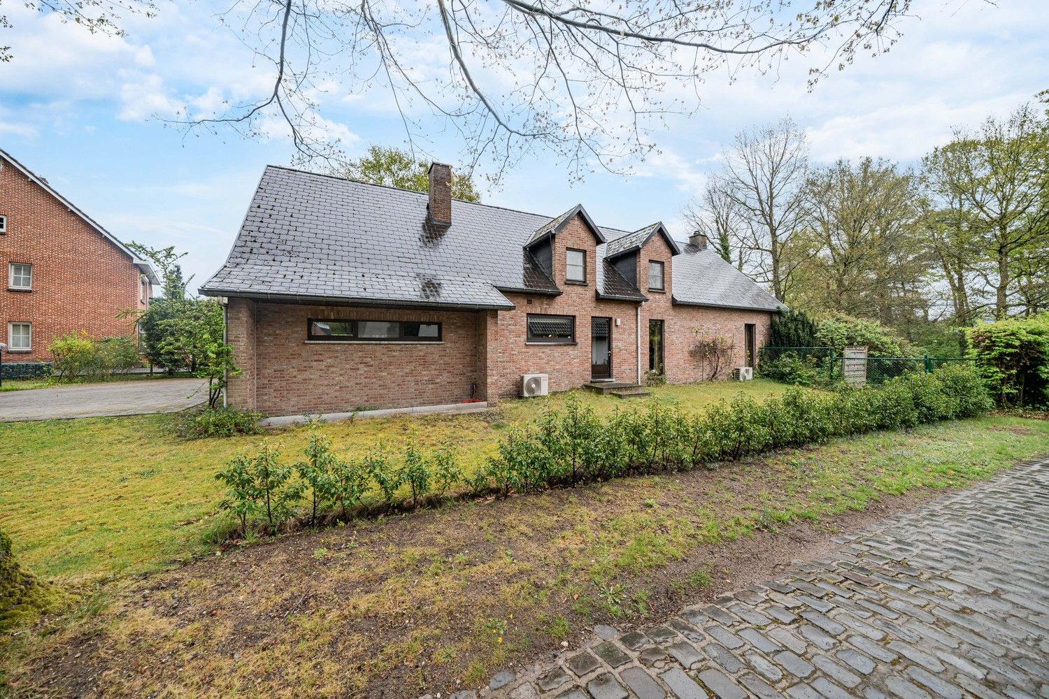 Ruime woning op groot perceel in residentiële buurt te Bret (Genk)! foto 6