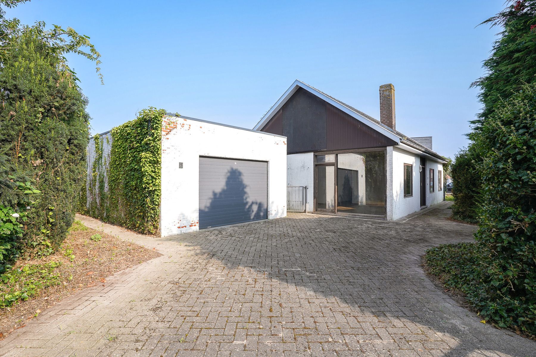 Te renoveren, open bebouwing met garage en veranda te Bornem foto 1