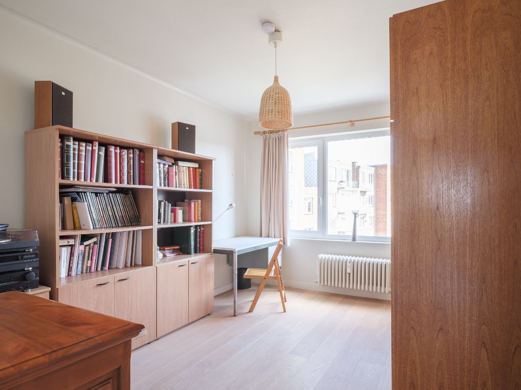 Lichtrijk appartement met 2 volwaardige slaapkamers, inpandig terras en gemeenschappelijke tuin, in een residentiële straat nabij het station Gent-Sint-Pieters. foto 13