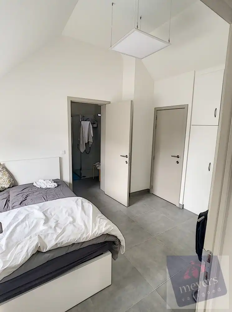 Handelsruimte met woonst op zichtbare ligging in Koersel foto 17