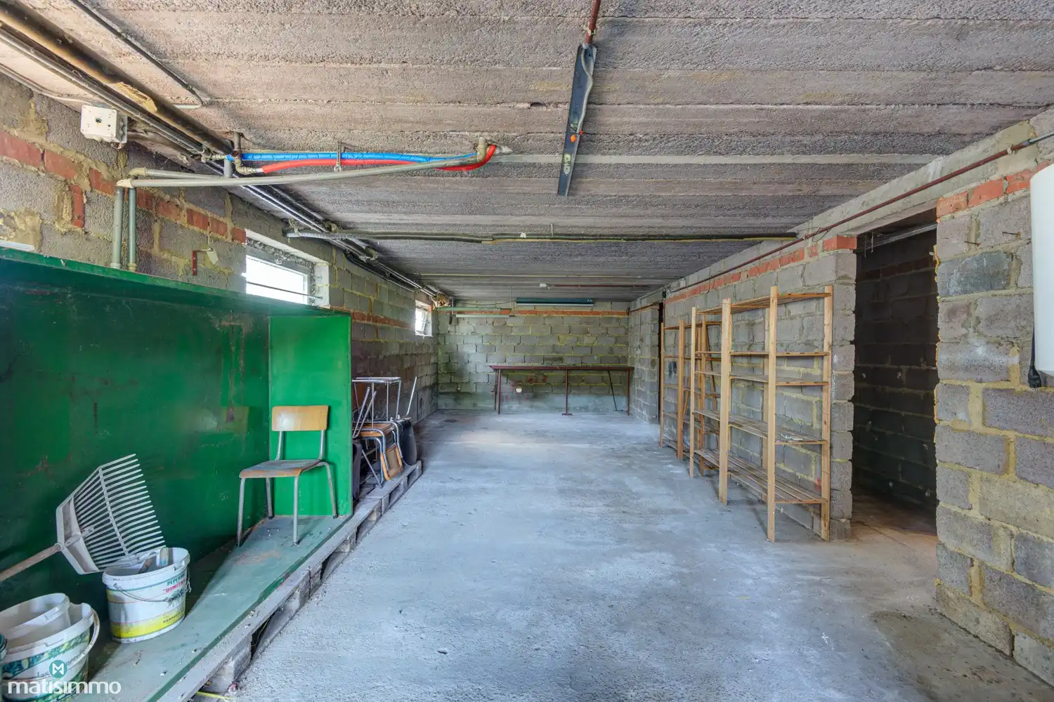 RUIME, GELIJKVLOERSE WONING (VOLLEDIG ONDERKELDERD), MET GARAGE EN TUIN NABIJ CENTRUM GENK foto 26