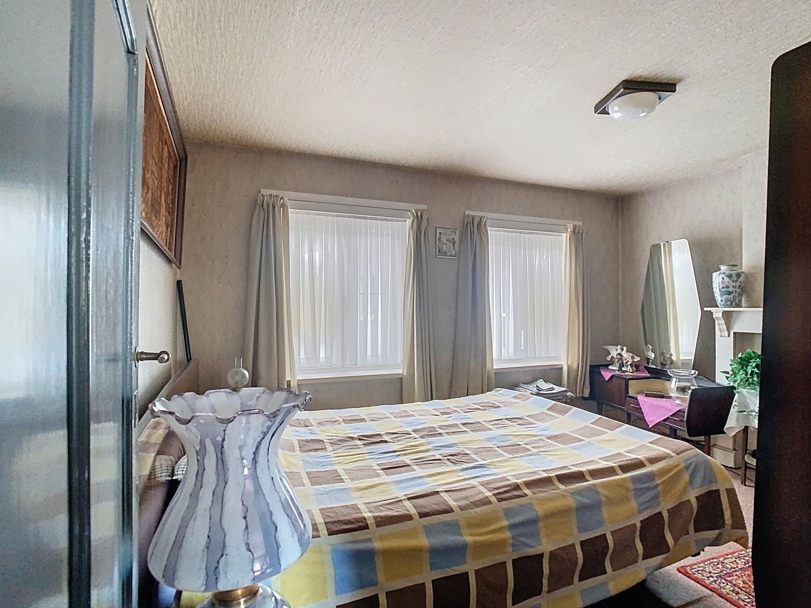 Centraal gelegen, Te renoveren Woning met 2 SLPK én Tuin! foto 11