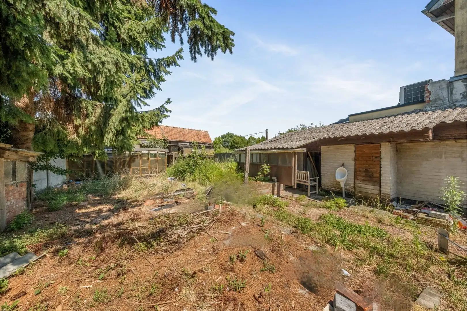 Landelijke woning te Oosterzele met uitzonderlijk renovatiepotentieel ! foto 18