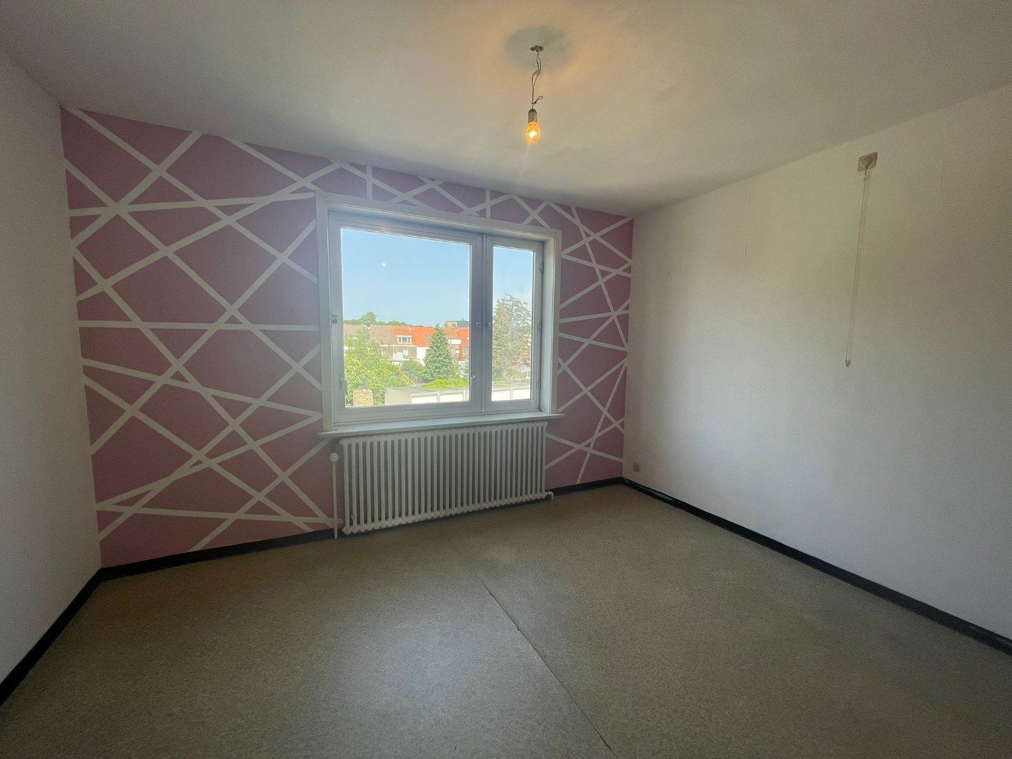 Te vernieuwen hoekappartement met terras in rustige straat in het hartje van Sint-Kruis. foto 13