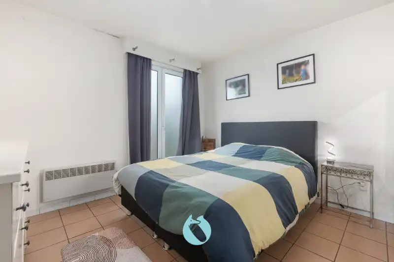 Gelijkvloers appartement met 2 slpks, tuin en garage foto 8