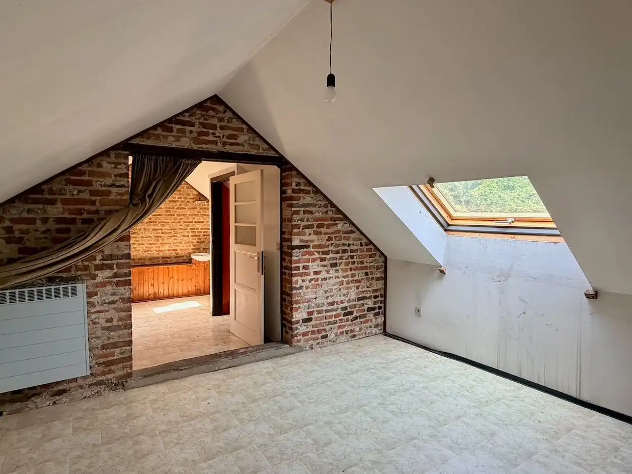 Ruime rijwoning met 4 slaapkamers, garage en tuin op toplocatie in Heverlee foto 17