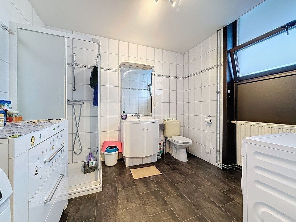 Centraal gelegen gelijkvloers appartement met tuin en garage foto 7