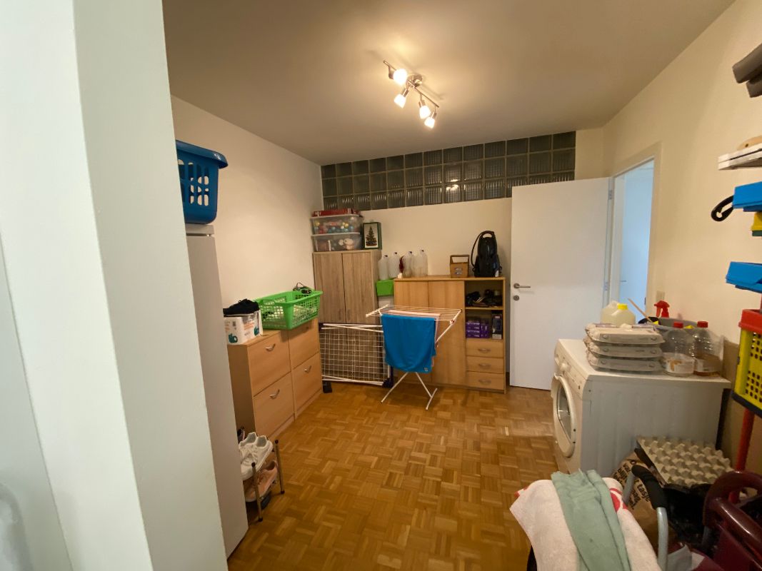 Gezellig gelijkvloers appartement met 2 slaapkamers en ingerichte dressing foto 7