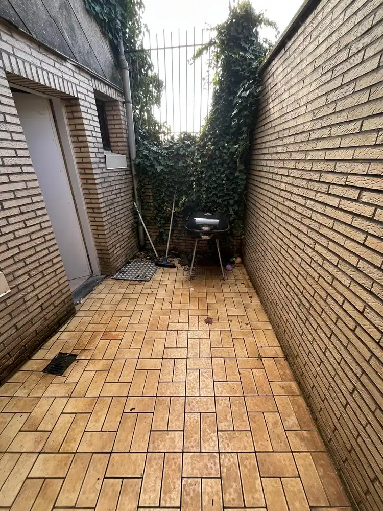 Rijwoning opgesplitst in twee appartementen foto 9