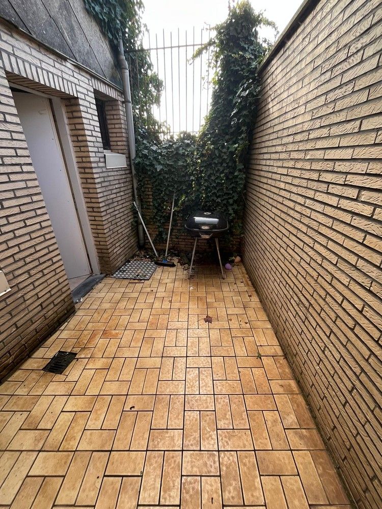 Rijwoning opgesplitst in twee appartementen foto 9