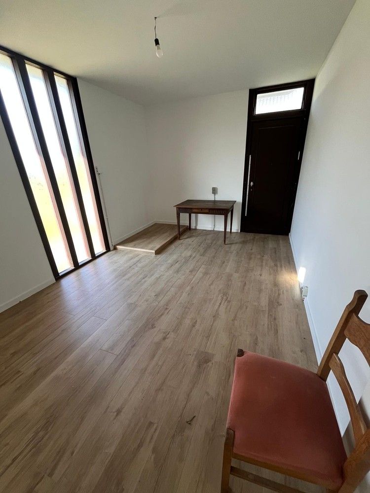 Gelijkvloerse woning met leuke stadstuin foto 12