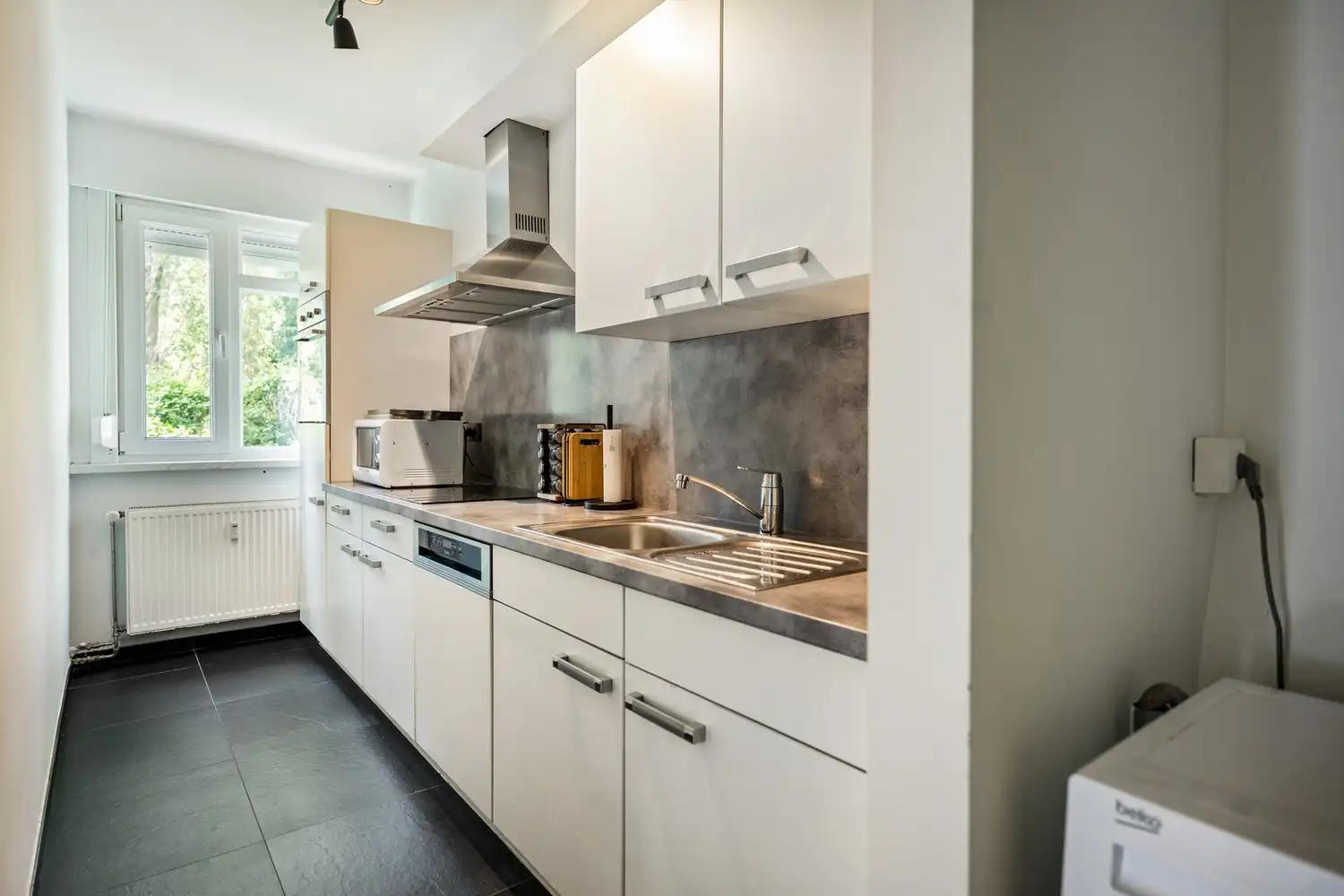 Instapklaar gelijkvloers appartement te Hoboken! foto 5