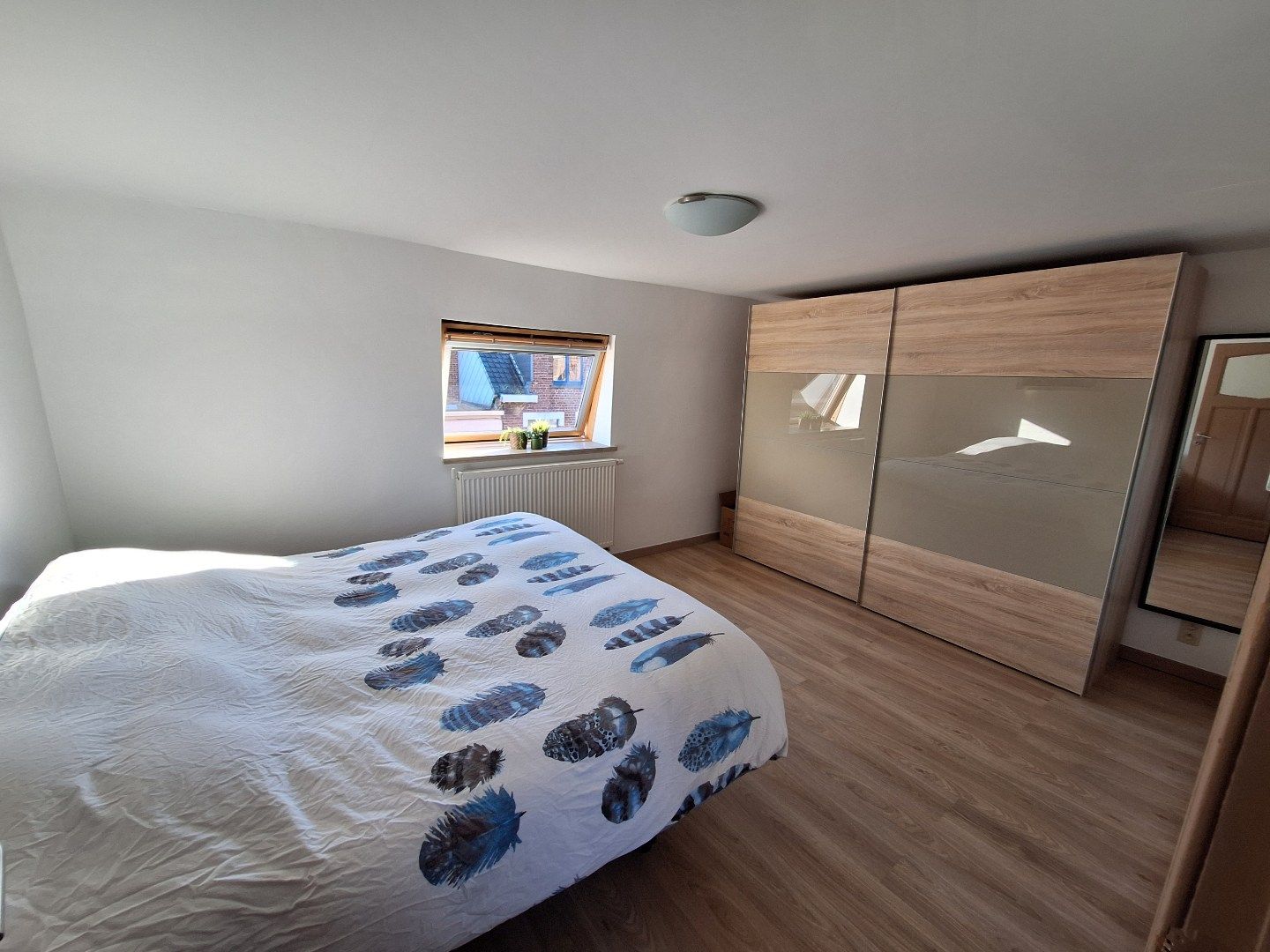 Gerenoveerde instapklare woning met terras en tuin foto 8