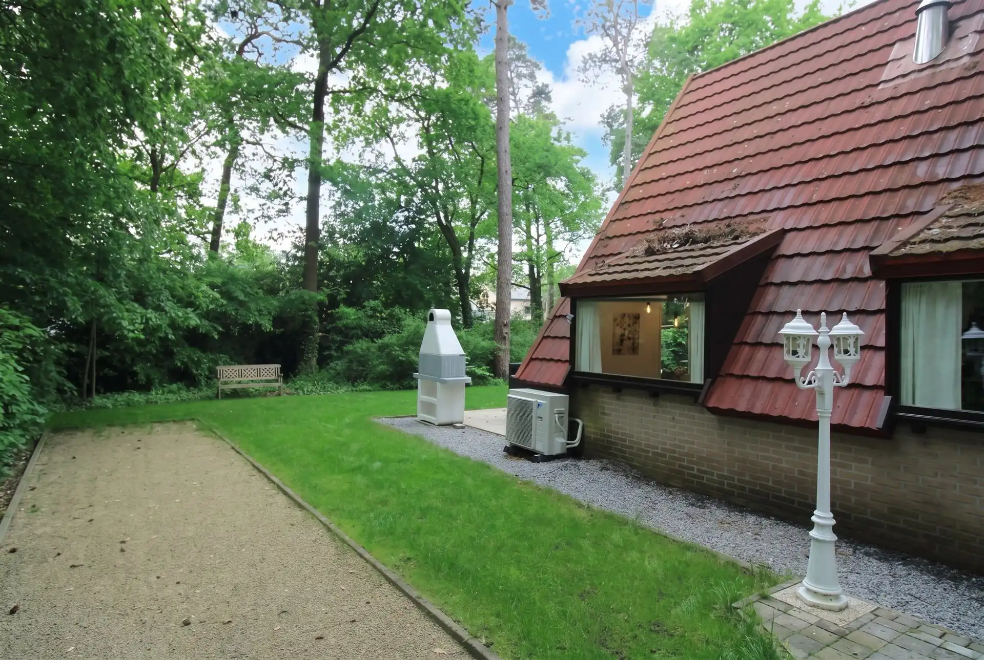 Vakantiewoning met 2 slaapkamers en ruime tuin op vakantiedomein Sonnevijver te Rekem! foto 15