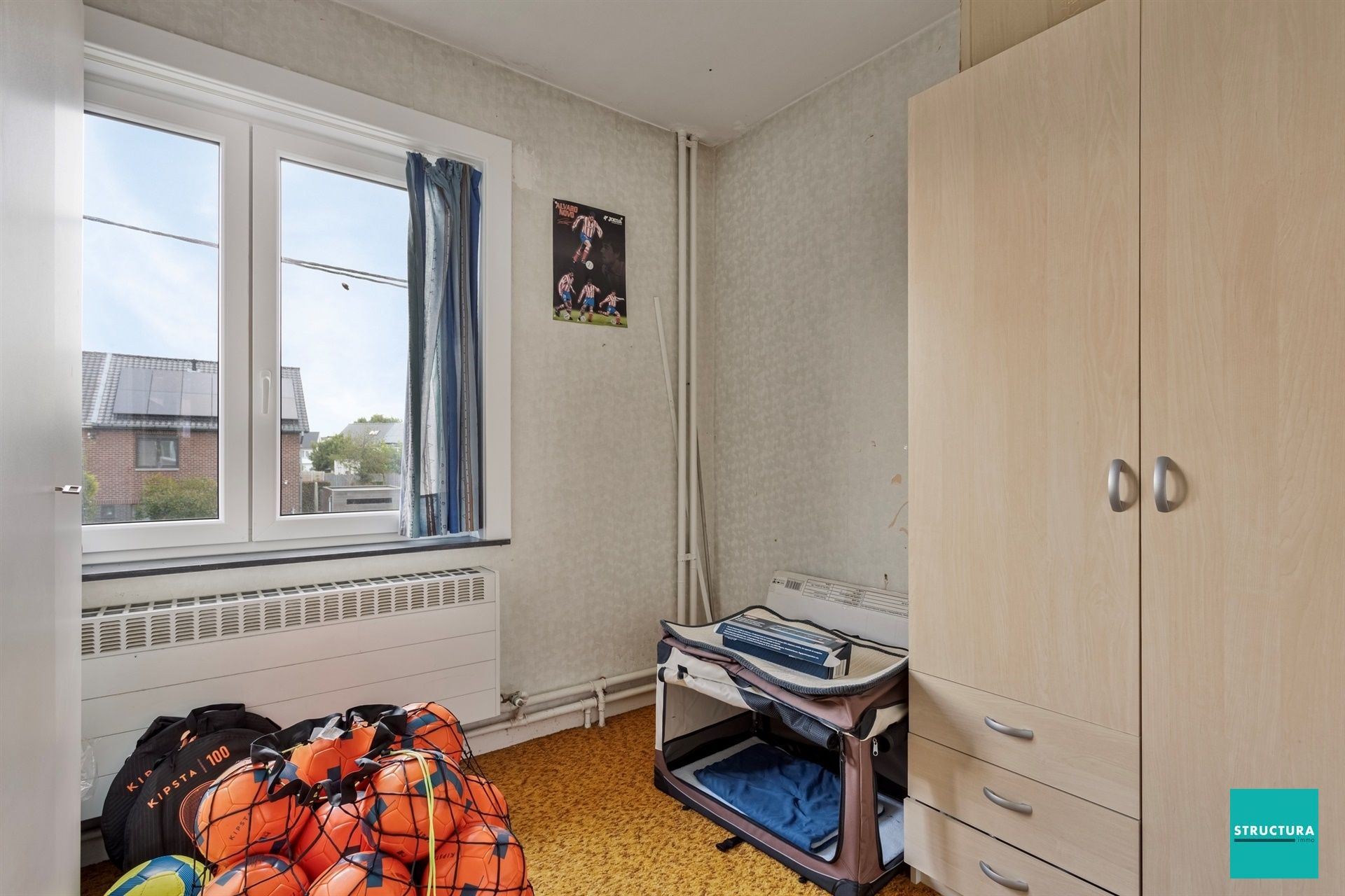 Driegevelwoning met Zuid-West tuin in rustige straat foto 12