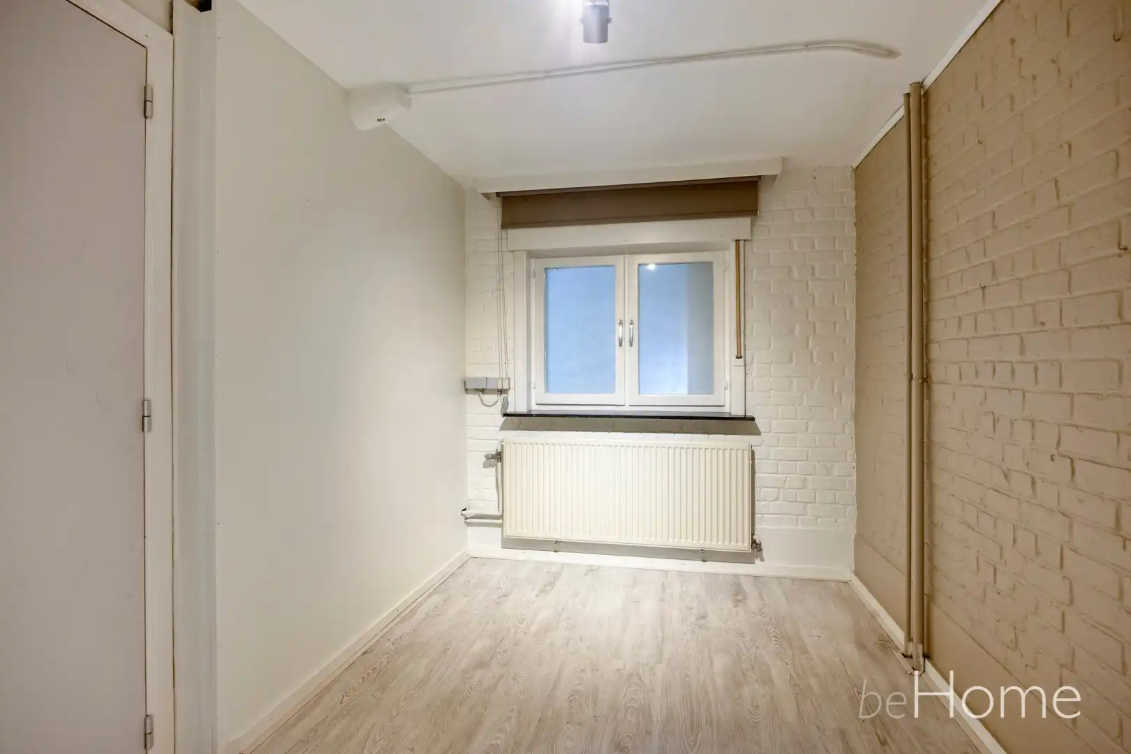 TE KOOP - Ruime 2-gevelwoning met praktijkruimte en uitzonderlijk potentieel in het hart van Merchtem foto 11