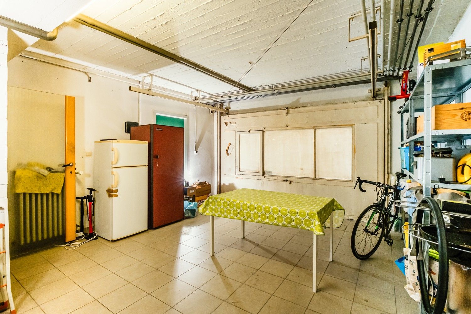 Ruim gelijkvloers appartement met garage! foto 18