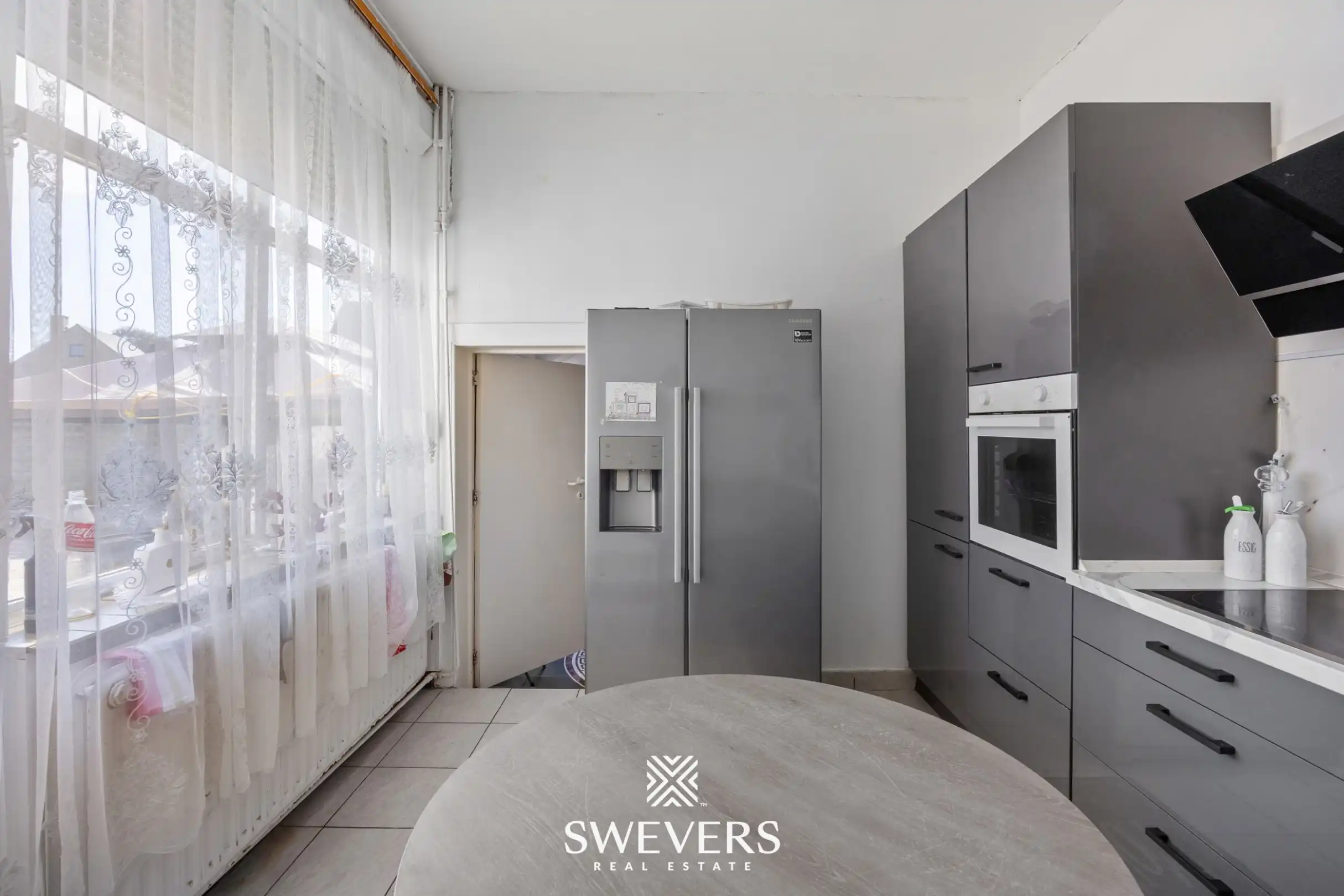 Ruime gezinswoning met 4 slaapkamers, aangename tuin en veel potentieel in Heers foto 9