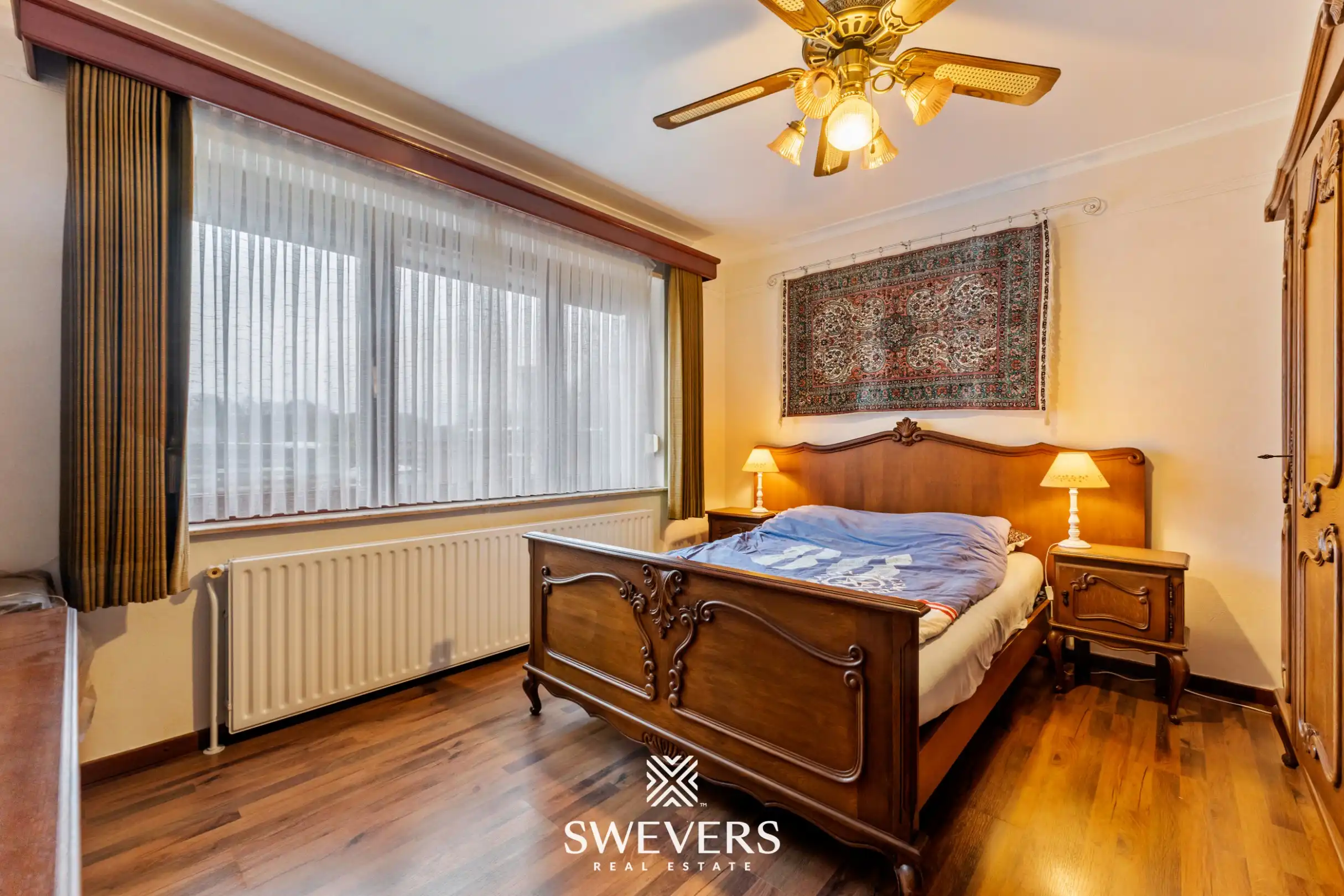 Open bebouwing met drie slaapkamers op uitzonderlijk groot perceel van 1.897 m² foto 15