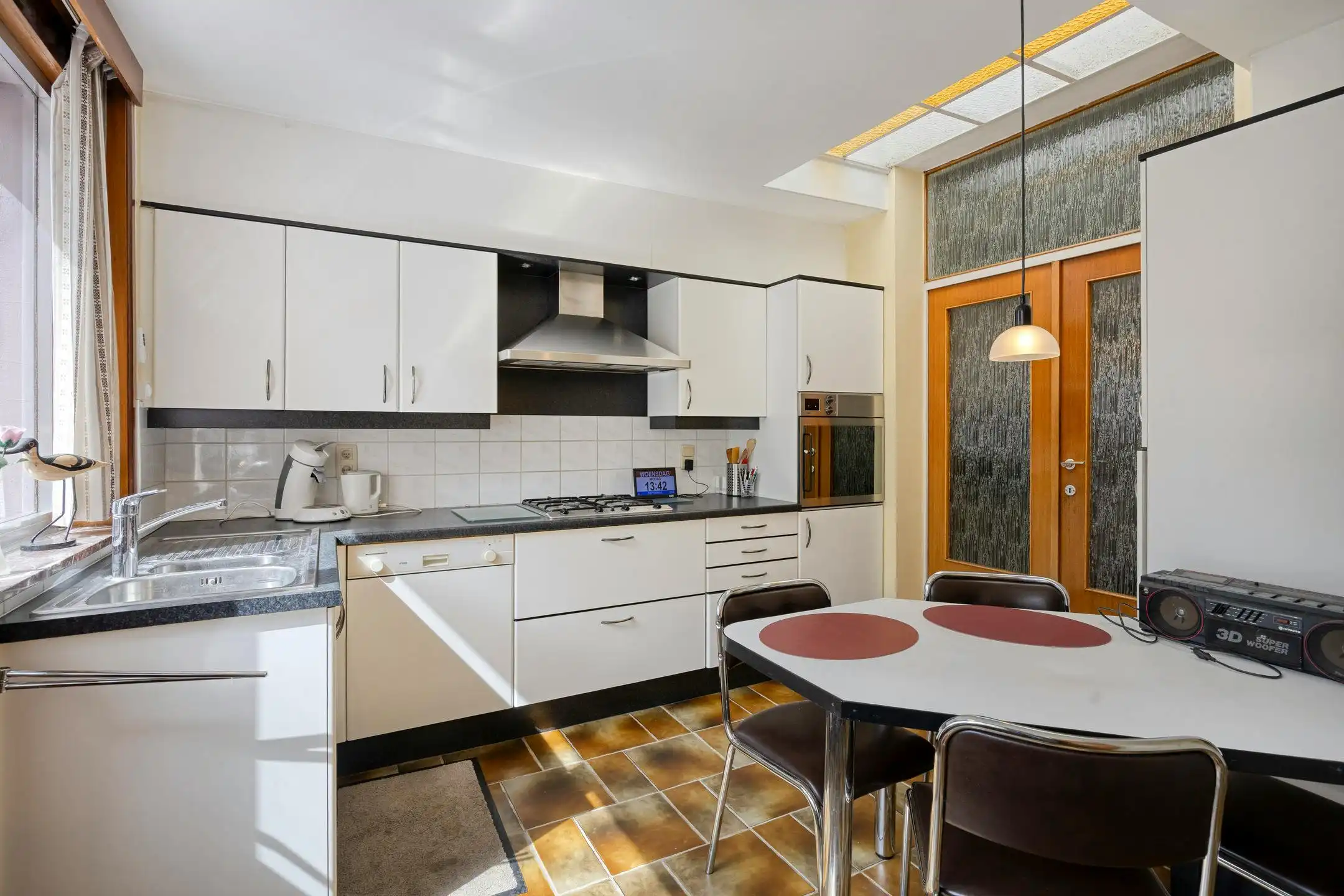 Huis met 3 kamers en zonnige tuin te koop in Vilvoorde foto 3