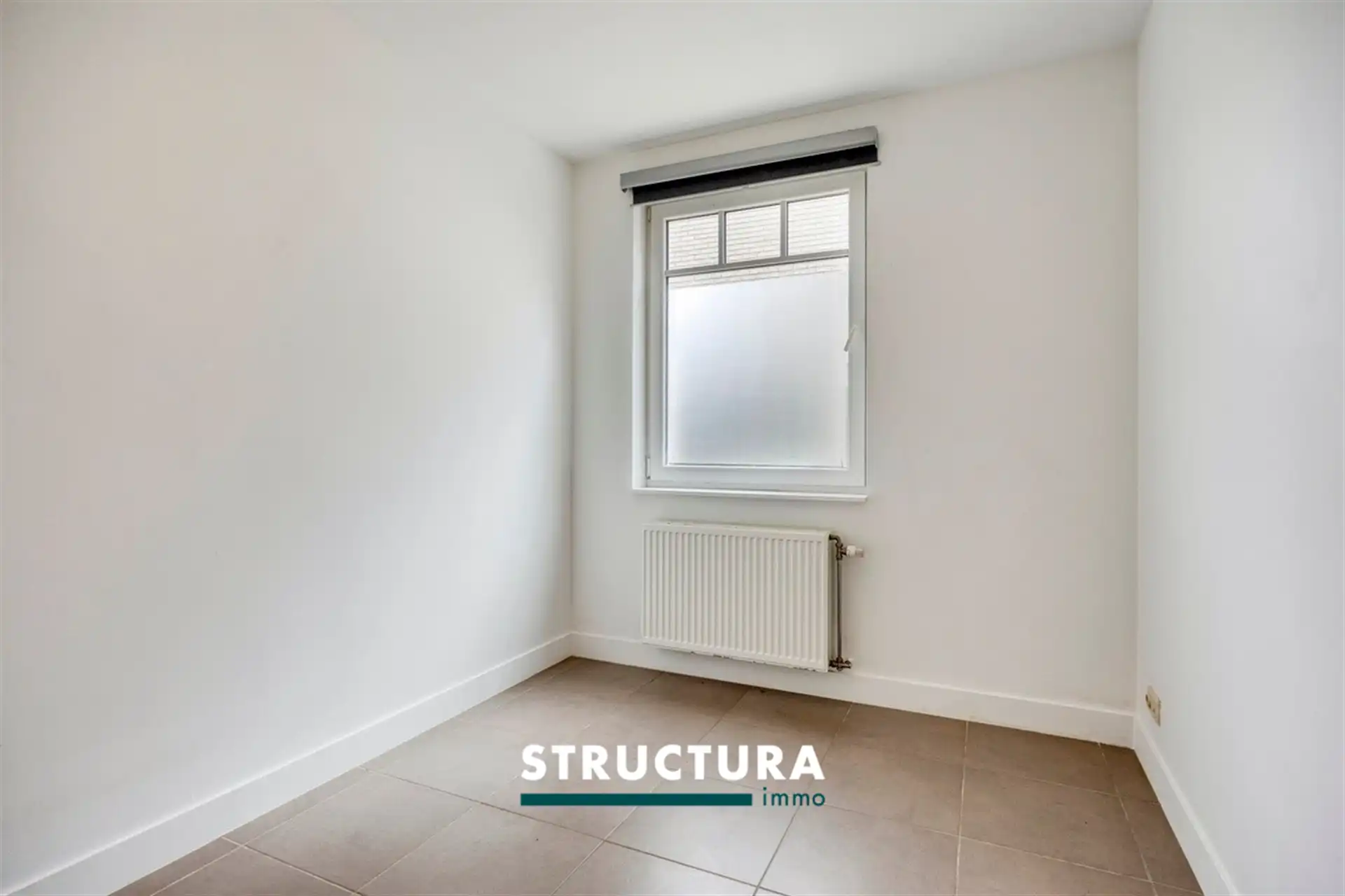 Gelijkvloers appartement met tuin nabij centrum foto 11