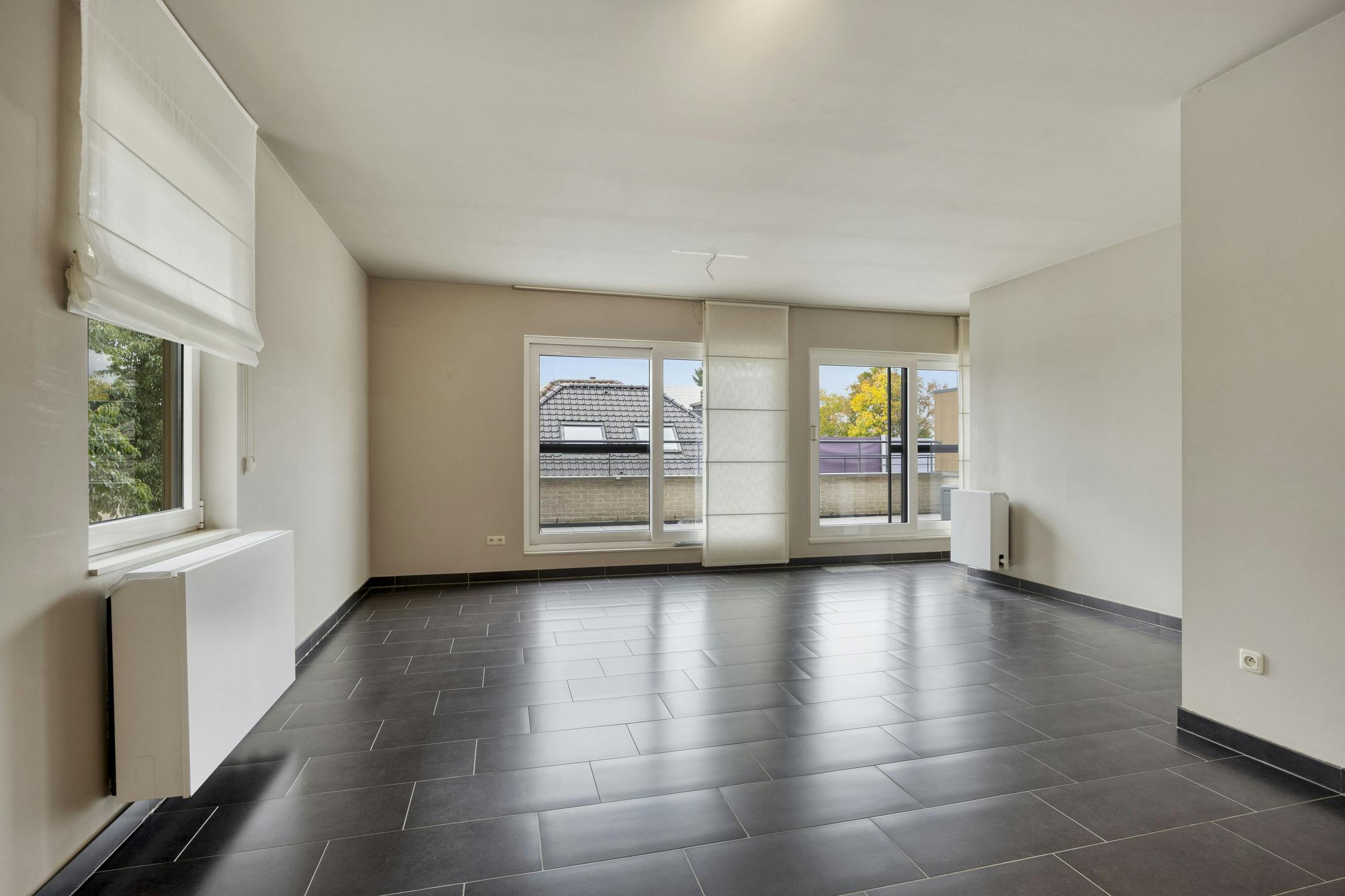 Instapklaar appartement met staanplaats en groot terras nabij centrum Diepenbeek foto 2