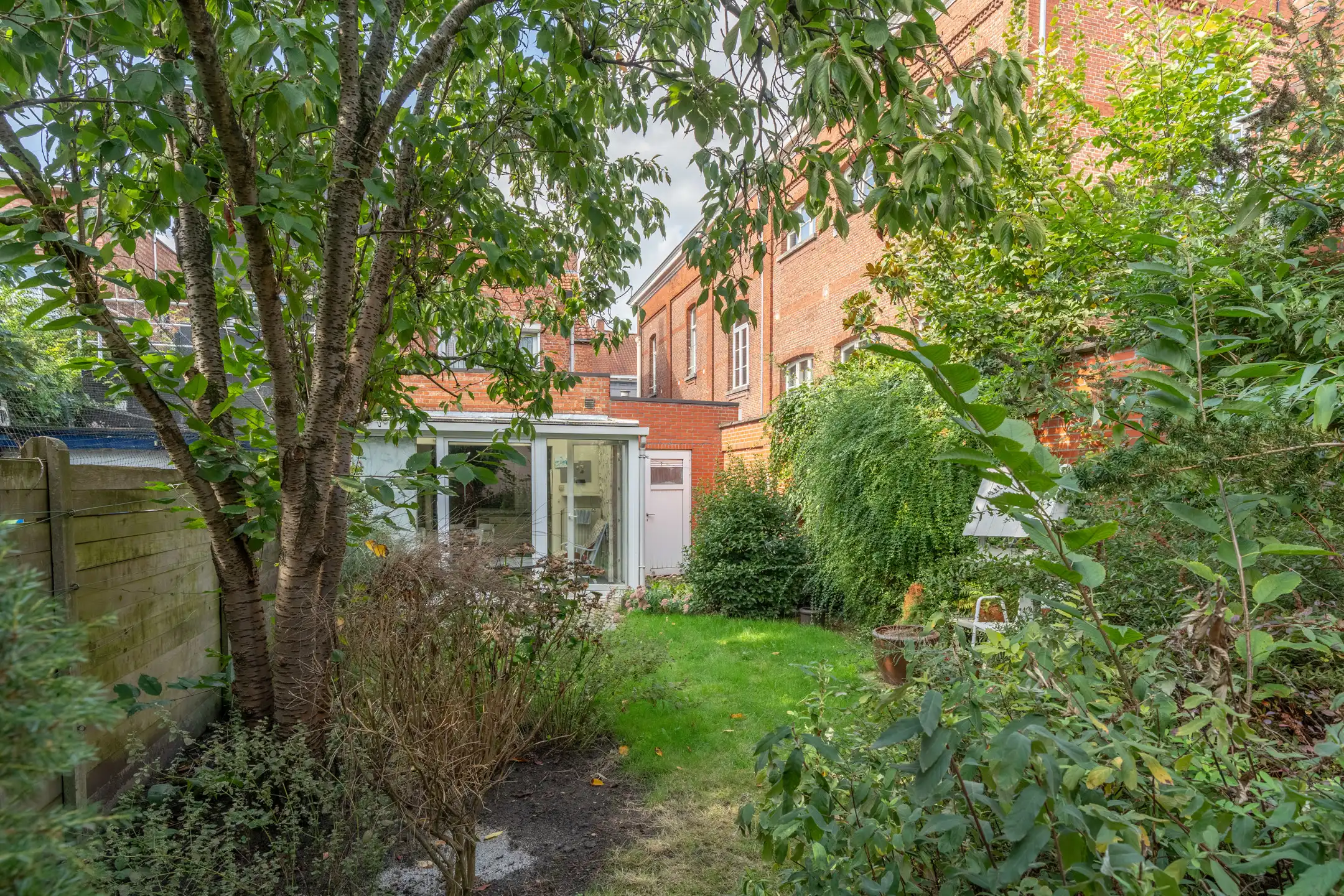 Charmante stadswoning met 2 wooneenheden, garage en tuin foto 37