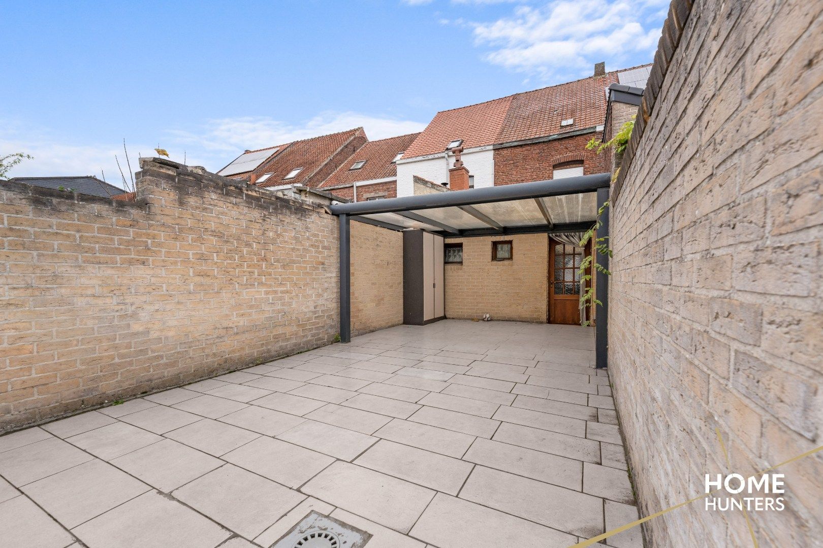 Charmante te renoveren rijwoning met 3 slaapkamers en diepe tuin op centrale ligging in Menen foto 27