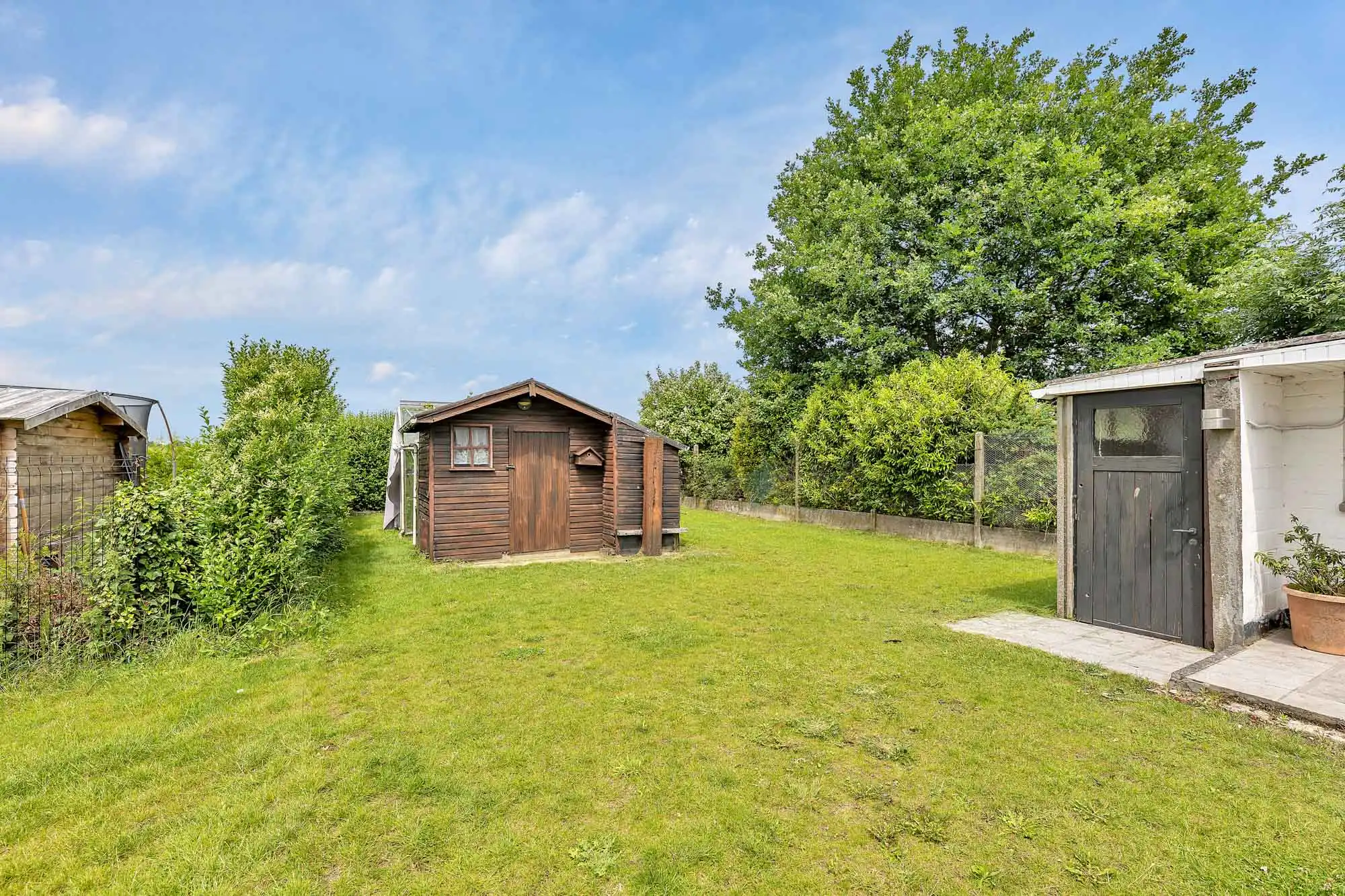 Goed onderhouden woning met garage en tuin foto 27