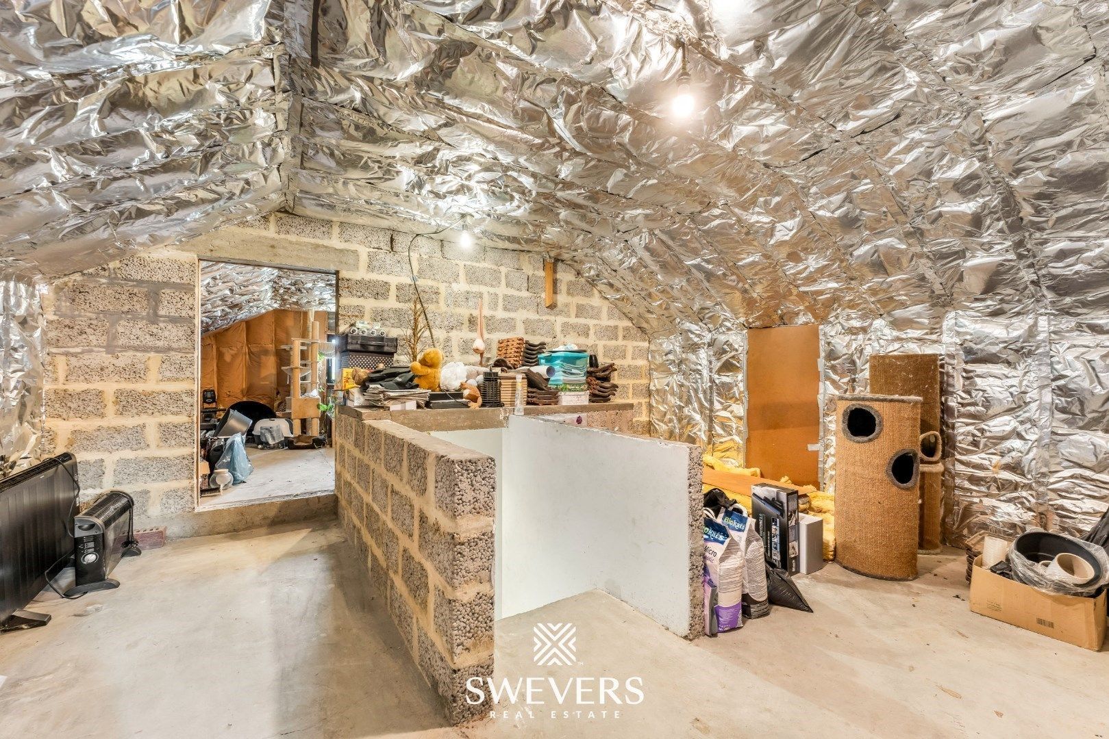 Ruime gezinswoning met zonnepanelen, kelder en zonnige tuin op topligging foto 19