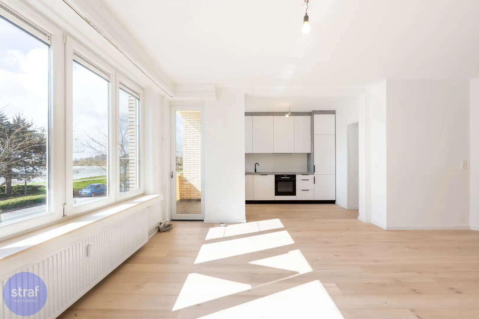 TE HUUR/ Gerenoveerd appartement met 2 slaapkamers, groot terras en zicht op het Galgenweel + 2 kelderbergingen foto 4